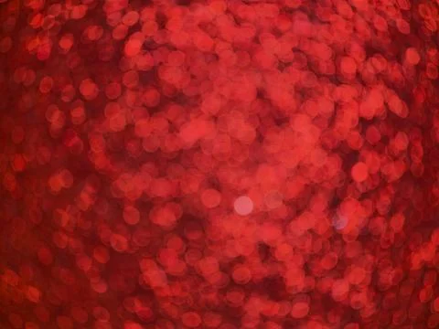 Red abstract bokeh background with soft blurred circle lights Stock Photos