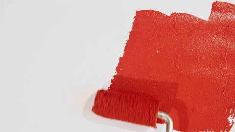 Red acrylic paint on a white background. Red watercolor brush strokes. Canvas Stock Footage 165921980