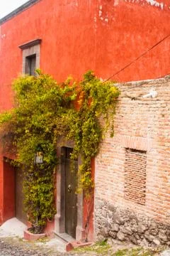 Red adobe house Stock Photos