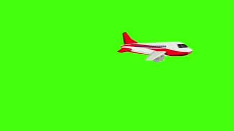 Red aeroplane flying on green background Stock Footage 166509893