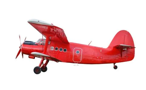 Red airplane biplane with piston engine Stock Photos