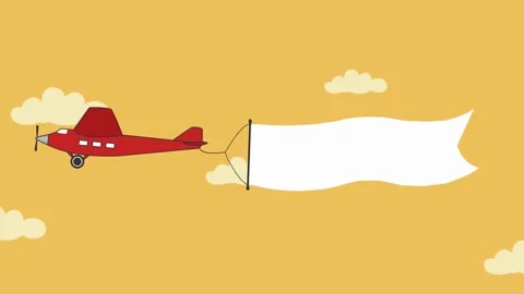 Red airplane towing a blank white banner across an orange sky aircraft Stock Footage 325868015