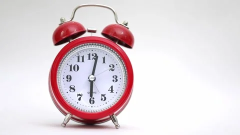 Red alarm clock on a light background Stock-Footage 220521233