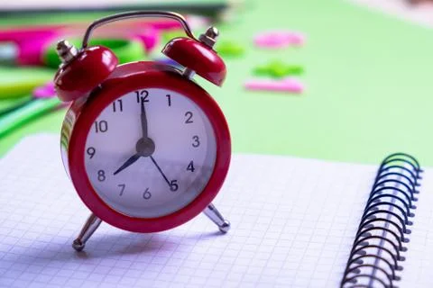 Red alarm clock on light Blank note. Reminder. Space for copy.Minimal concept Stock Photos