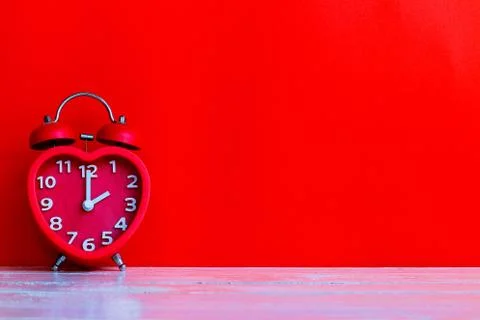 Red alarm clock mark at 14.00 o'clock Stock Photos