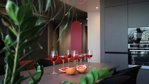 Red alcoholic drinks in glasses on the table Stock Footage 202412564