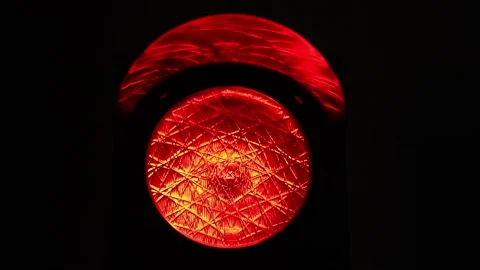The red alert stoplight of a traffic light or a semaphore at night in the city. Stock-Footage 143600801