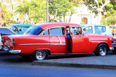 Red american old timer car in Havana, Cuba Stock Photos