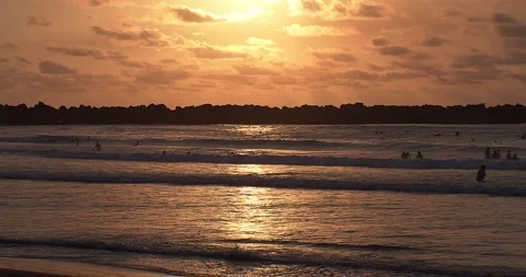 Red and beautiful sunset on the beach Stock Footage 135860475
