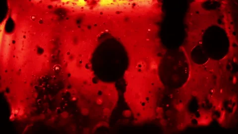 Red and black abstract background chemichal reaction Stock Footage 86433083