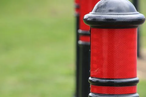 Red and black bollards Stock Photos