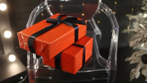 Red and black boxes with New Year's gifts. Concept New Year's gifts. Stock Footage 205937156