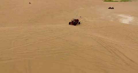 Red and Black Dune Buggy Racing Towards Camera in Zion National Park 動画素材 247300944