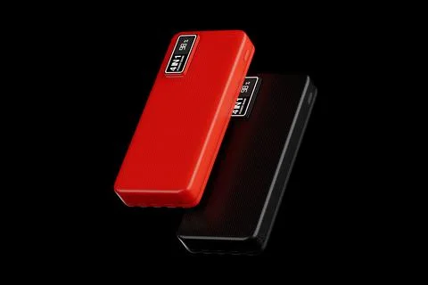 Red and Black Mobile Devices Charging Power Banks. 3d Rendering Stock Illustration