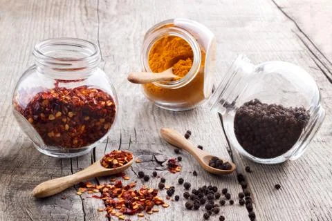 Red and black pepper Stock Photos