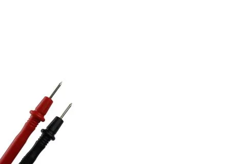 Red and black probe from the voltmeter on a white background. Stock Photos