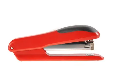 Red and black stapler isolated with clipping path. Stock Illustration