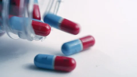 Red and blue acetaminophen capsule Video | Pond5