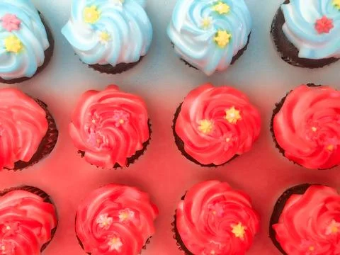 Red and Blue Arranged Cupcakes Stock Photos
