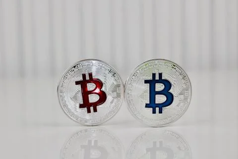 Red and blue bitcoin Stock Photos