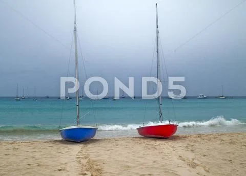 Red and blue boats Stock Photos