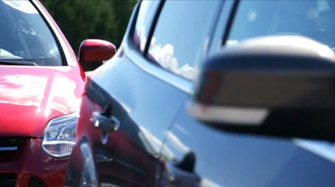 Red and blue car close-up focus on back mirror Stock Footage 6532277