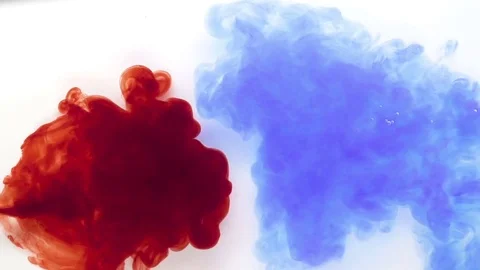 Red and blue ink mix background Stock Footage 72477161