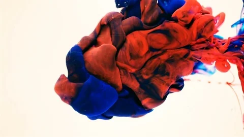 Red and Blue Ink mix in water Stock Footage 85247607