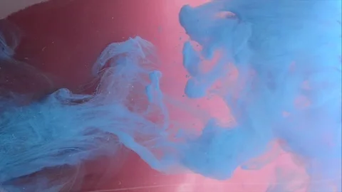 Red and Blue ink in water. Acrylic splash on white background,art,liquid footage Stock Footage 106775868