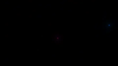 Red and blue light particles tend to collide with each other. Space catch-up Stock Footage 130407745