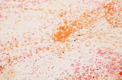 Red and blue paint splashes on grunge wall. Abstract hand painted backdrop for Stock Photos