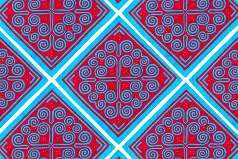 Red and blue patterns on the rectangular fabric, backgrounds Stock Photos
