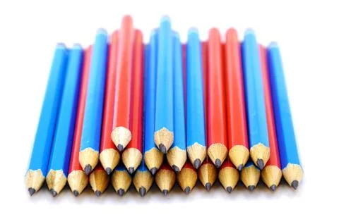 Red And Blue Pencils Over White Background Foto stock