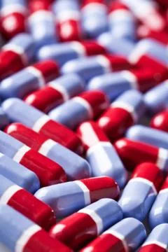 Red and blue tablets texture Stock Photos
