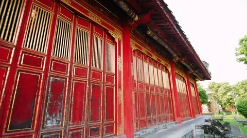 Red and gold facade of building in the imperial city of hue, vietnam Stock Footage 336999366