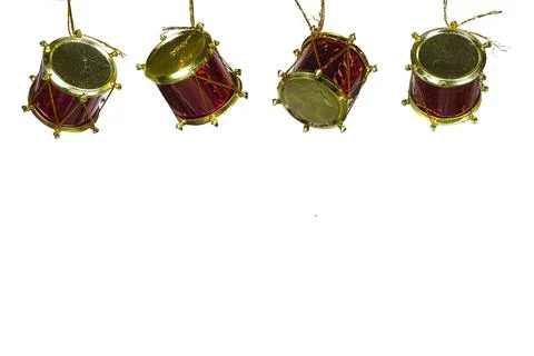 Red and Gold Mini Drum Christmas Ornaments Hanging on White Background for Holid Stock Photos