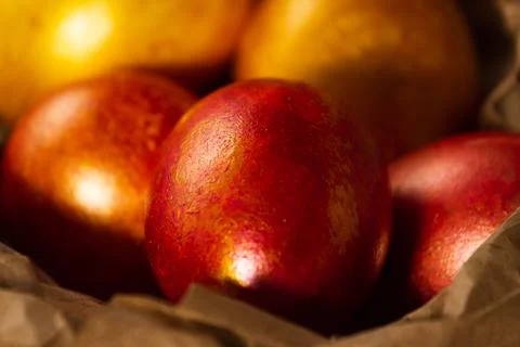 Red and golden Easter eggs close-up. Stock Photos