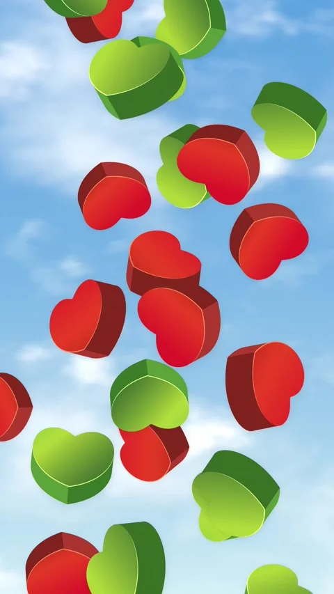 Red and Green 3D Hearts Falling Against a Blue Sky Stock Footage 345125158