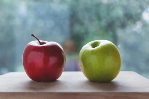 Red and green apples together Stock Photos