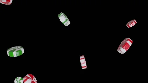Red and Green Mint Candy Falling Loop with Alpha Matte Stock Footage 135636869