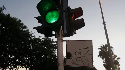 Red and green traffic light, sign with hand presses button, graffiti, Tel-Aviv Видео 80157005