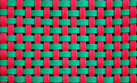 Red and green weave pattern background Foto stock