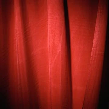 Red and maroon shiny cloth curtain material texture background Stock Photos