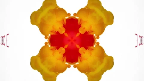 Red and orange ink expands across a white background Stock-Footage 338107199