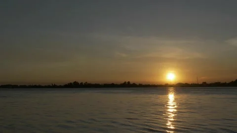 Red and orange sunset reflection over Barito river, landscape Stock Footage 141303265