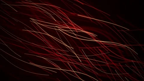 Red and pale gold light trails flow in a seamless loop Stock Footage 341666101