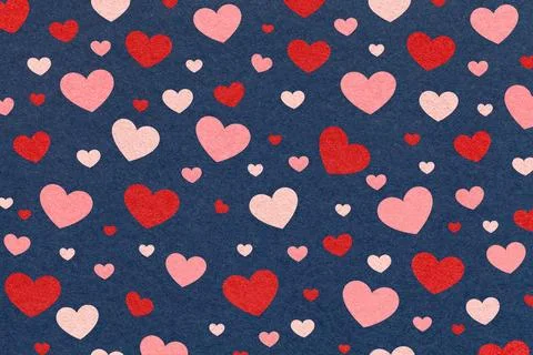 Red and pink hearts pattern on dark blue textured paper background for roma.. Stock Illustration