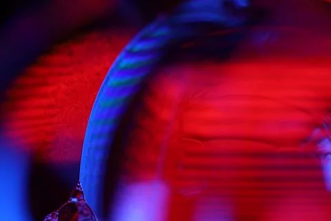 Red and purple liquid surface reflection, multicoloured art Stock Photos