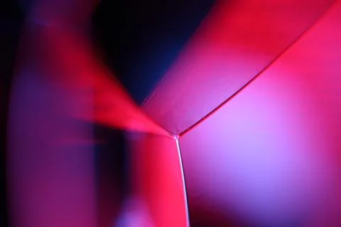 Red and purple liquid surface reflection, multicoloured art Stock Photos