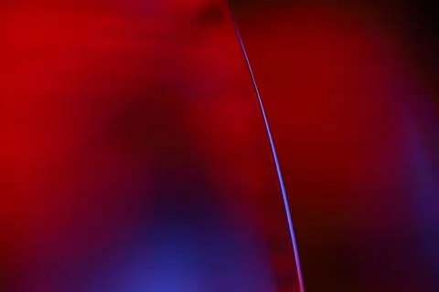Red and purple liquid surface reflection, multicoloured art Stock Photos